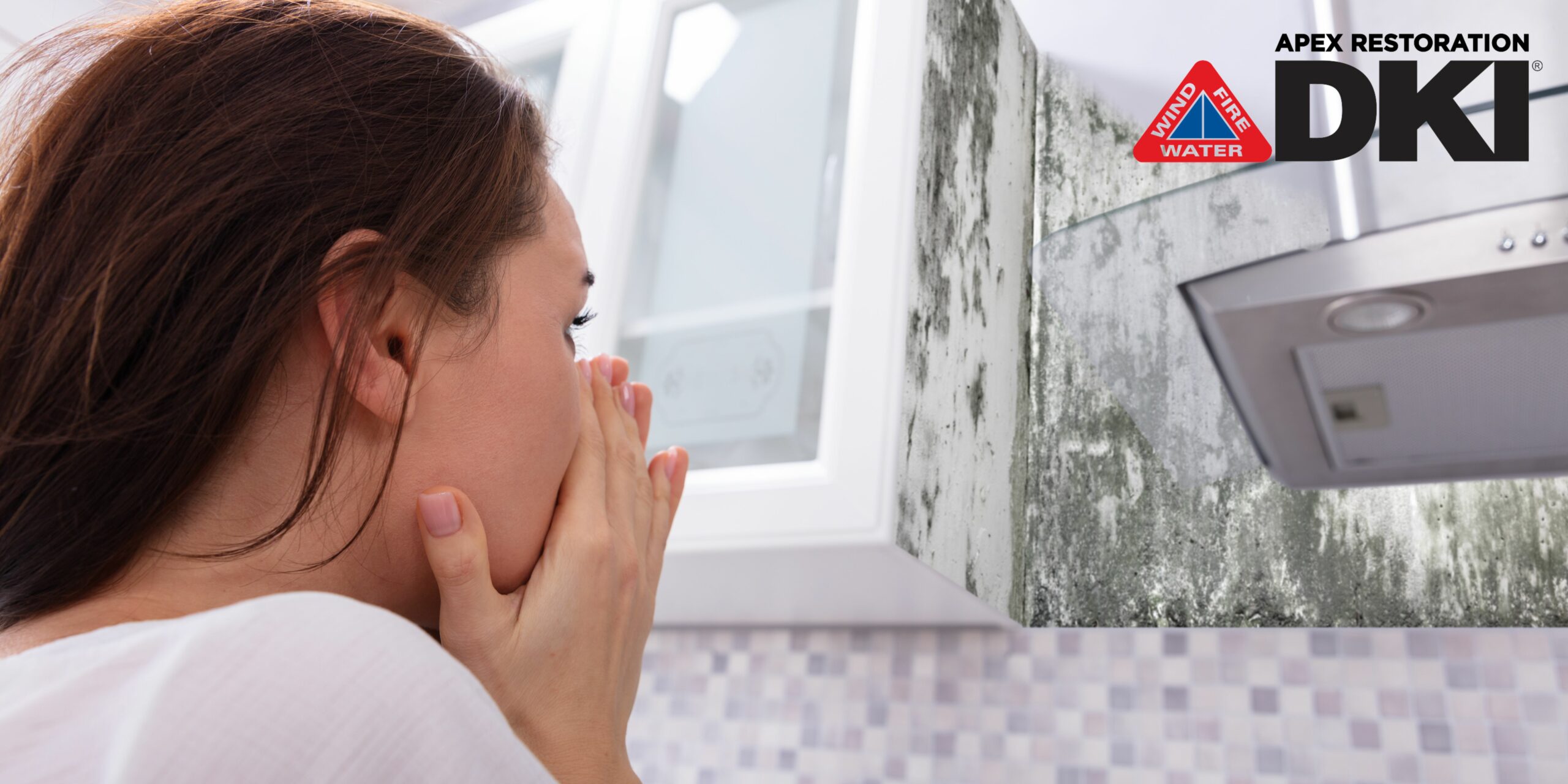 The woman shocked seeing mold in kitchen at Jackson, TN.