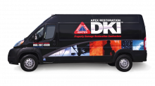 A van from a damage restoration services company